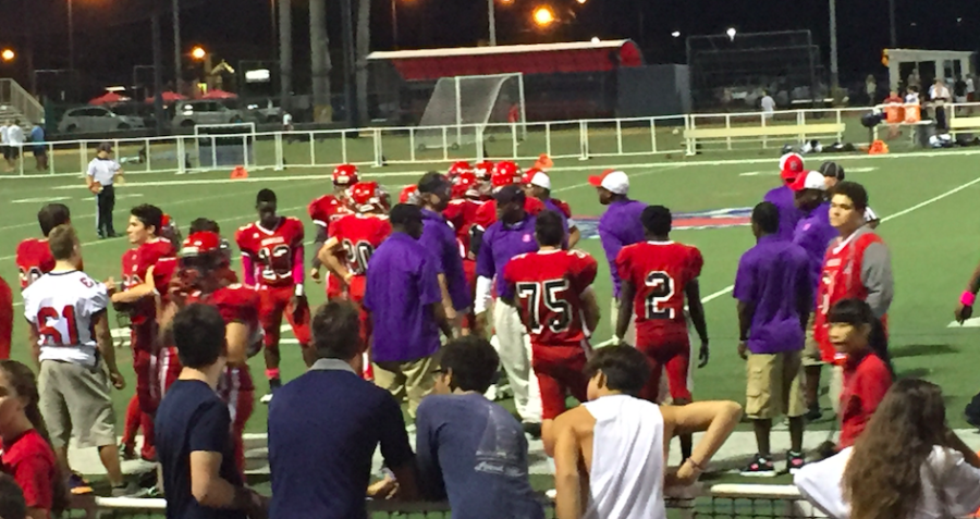 Spartan teammates offer support during this years homecoming face off with Highland Christian.