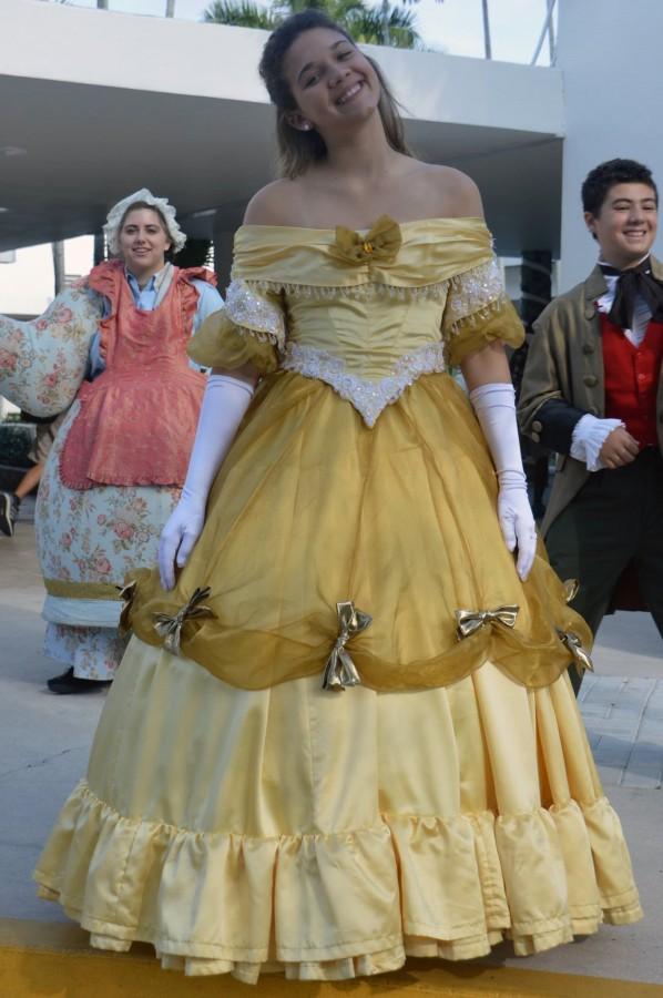 Belle visits the lower school students during morning announcements