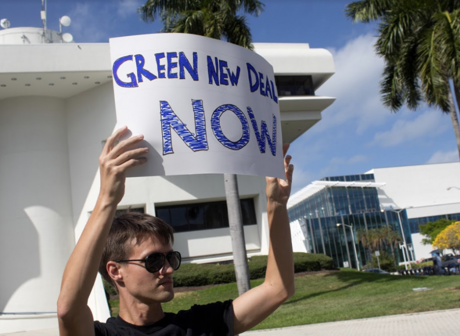 Green New Deal Now!! Protesting student in March in front of Miami Beach City Hall