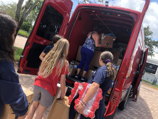 Students packing the first relief van to go the Bahamas. 