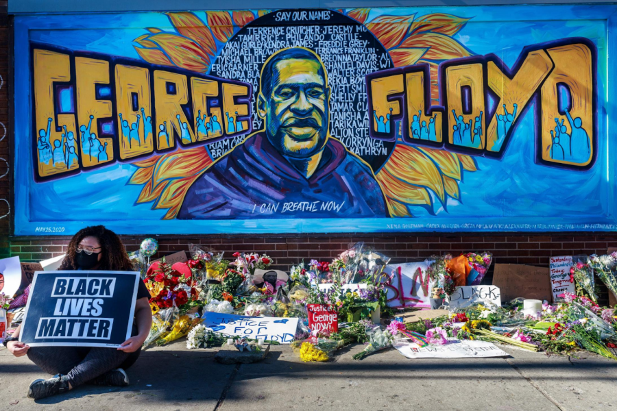 This is just one of the many memorials set up for  Justice for George. This mural is in Minneapolis.